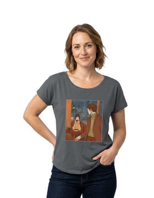 Load image 1 in gallery view. Woman wearing a gray t-shirt with a graphic design on a white background